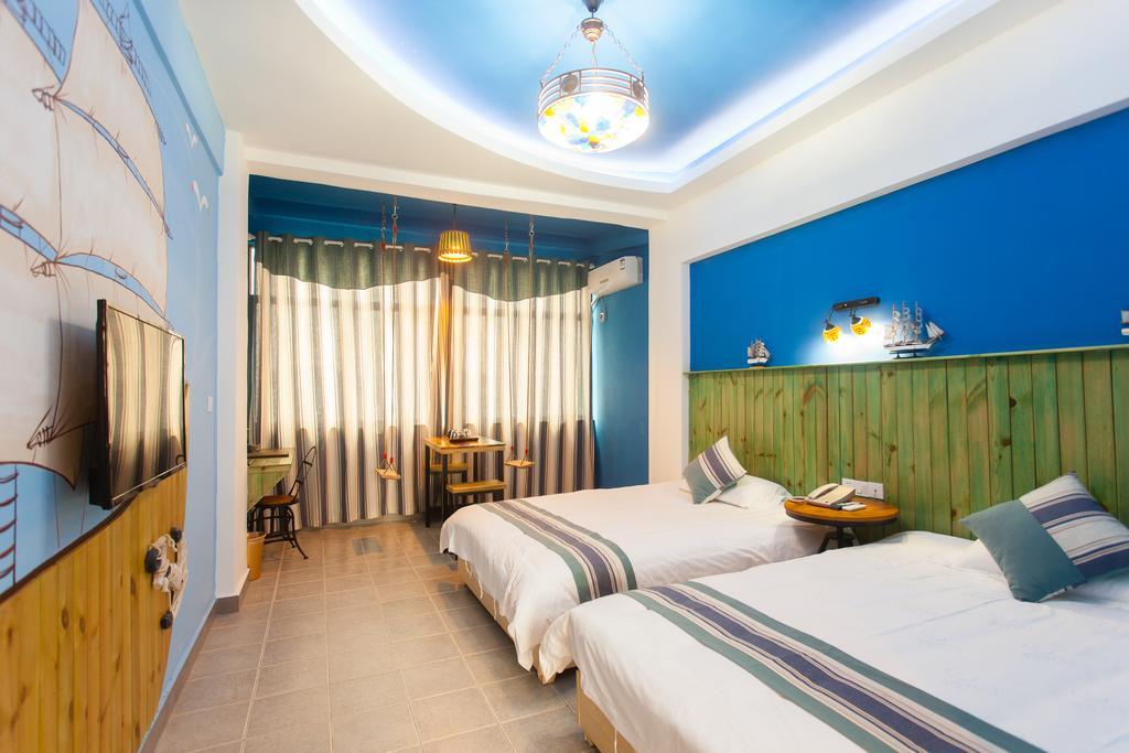 Haikou Time Inn Theme Hotel Номер фото