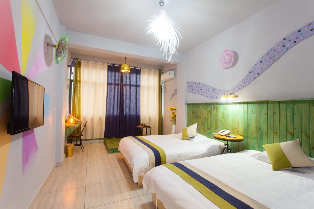 Haikou Time Inn Theme Hotel Номер фото